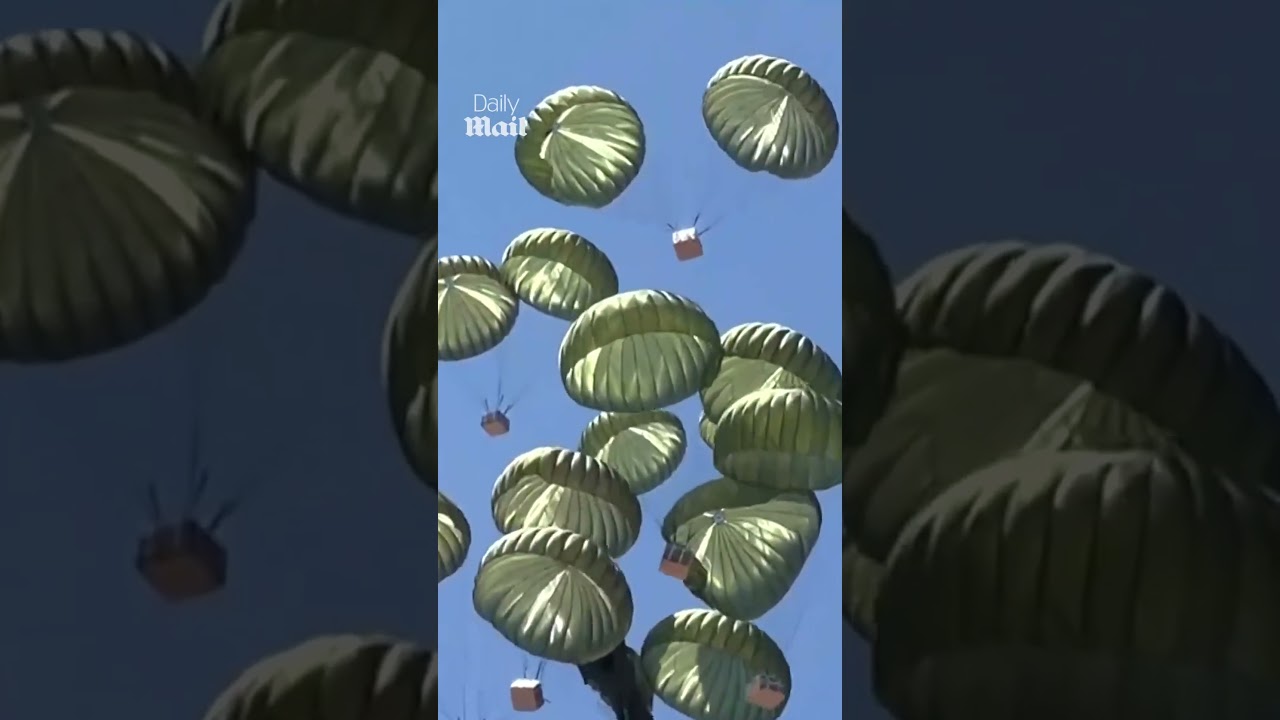 Palestinians in Gaza rush to retrieve air-dropped aid containing lentils and tomato paste