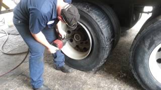 Changing tire at the TA truck stop in St. Johns Florida