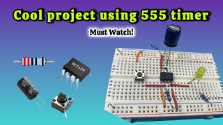 Build a time delay circuit using 555 timer IC on breadboard. With explanation!