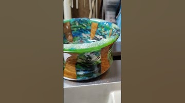 wood-turning my first successful pine cone in resin project.