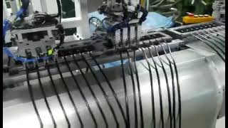 Full auto power cord plug insert crimping injection producing line with winding testing included