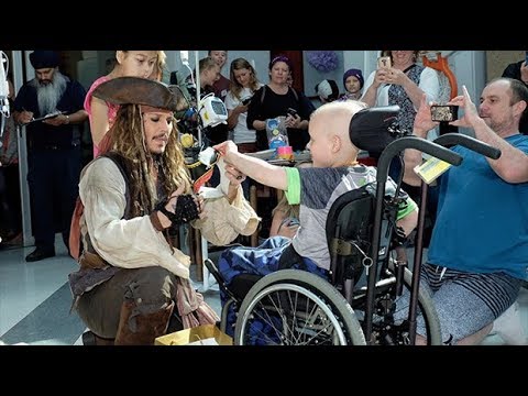 Johnny Depp surprises children's hospital patients dressed as Captain Jack Sparrow