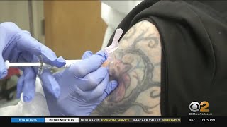 Medical Experts Cautiously Optimistic With COVID-19 Vaccine Trial Underway