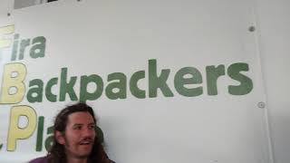 Fira backpackers John playing in Santorini, Greece