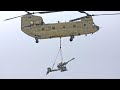 Lifting the M119 Howitzer by CH-47 Chinook Helicopter