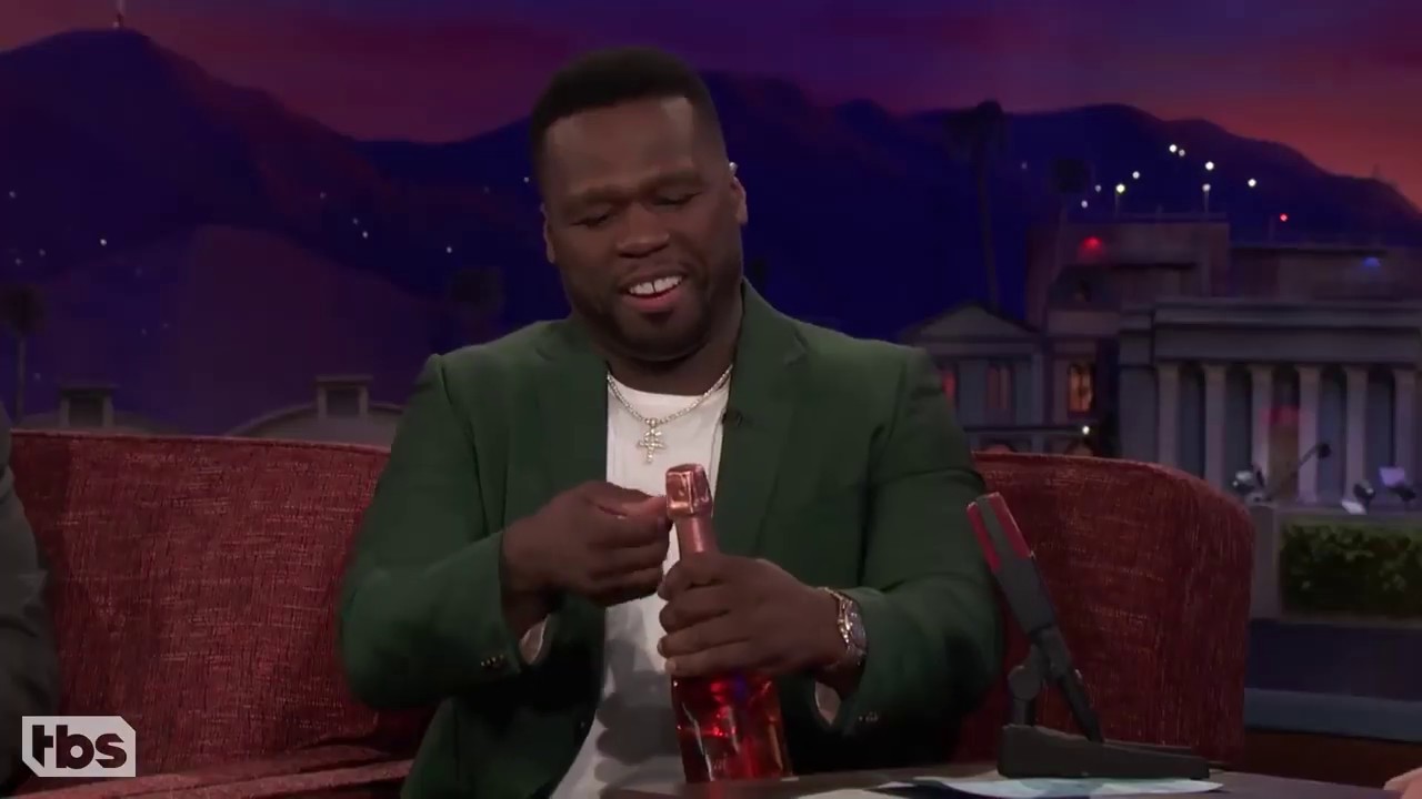 Curtis “50 Cent” Jackson Pops A Bottle Of Pink Champagne CONAN on TBS