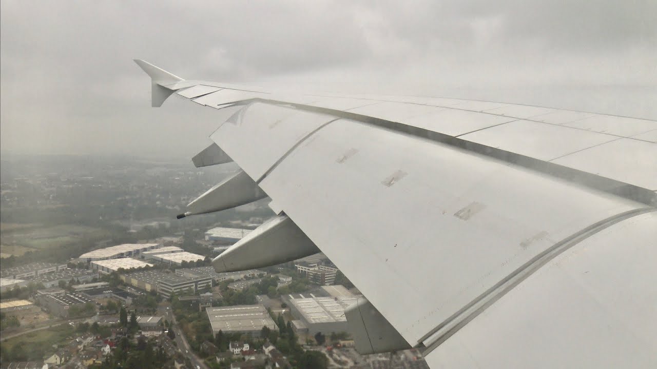 [4K] Emirates A380-800 Landing at Düsseldorf Airport (DUS) - Incredible Wing View + Condensation