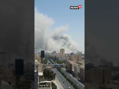 Tehran Burning Smoke Rises Amid Israel Iran Air War N18S