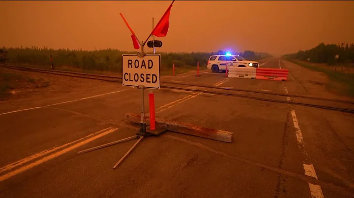 Wildfires force another 1,000 residents from their homes in Canadian province of Manitoba