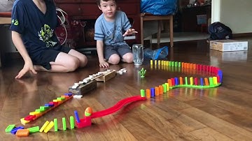 Slow motion dominos falling