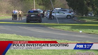 Police investigate shooting behind apartment building