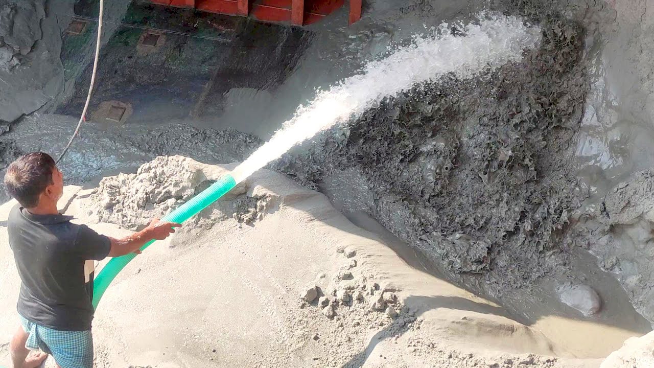Power of Water: Skilled Worker Unleashes High-Pressure Jet to Move Tons of Sand!