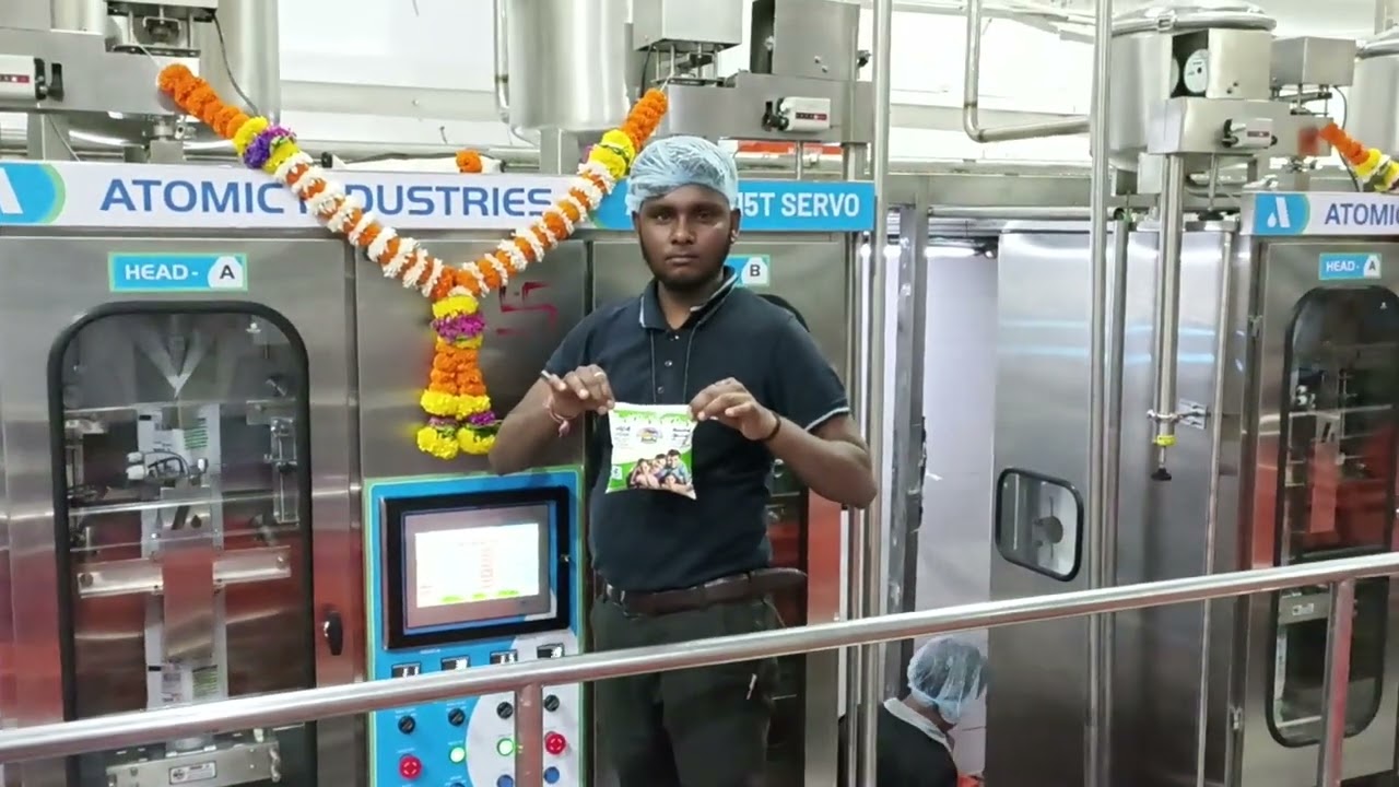 Atomic industries  milk packing  production Running