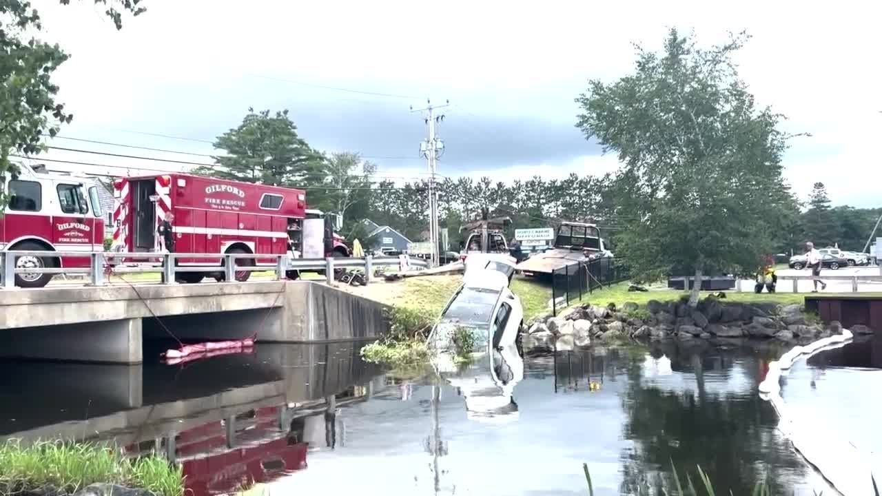 Mercedes SUV plunges into water near New Hampshire yacht club - YouTube