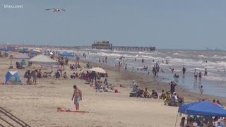Beautiful weather draws large crowds to Texas beaches after they reopen over the weekend