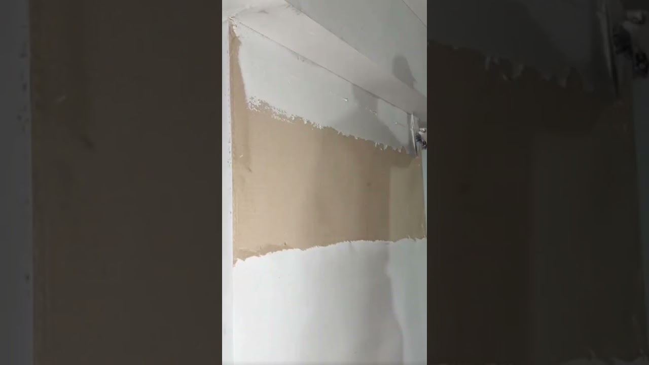 Professional Technique applying wall plaster precisely using a smart laser level guide