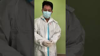 Level 4 PPE Cover All - Donning