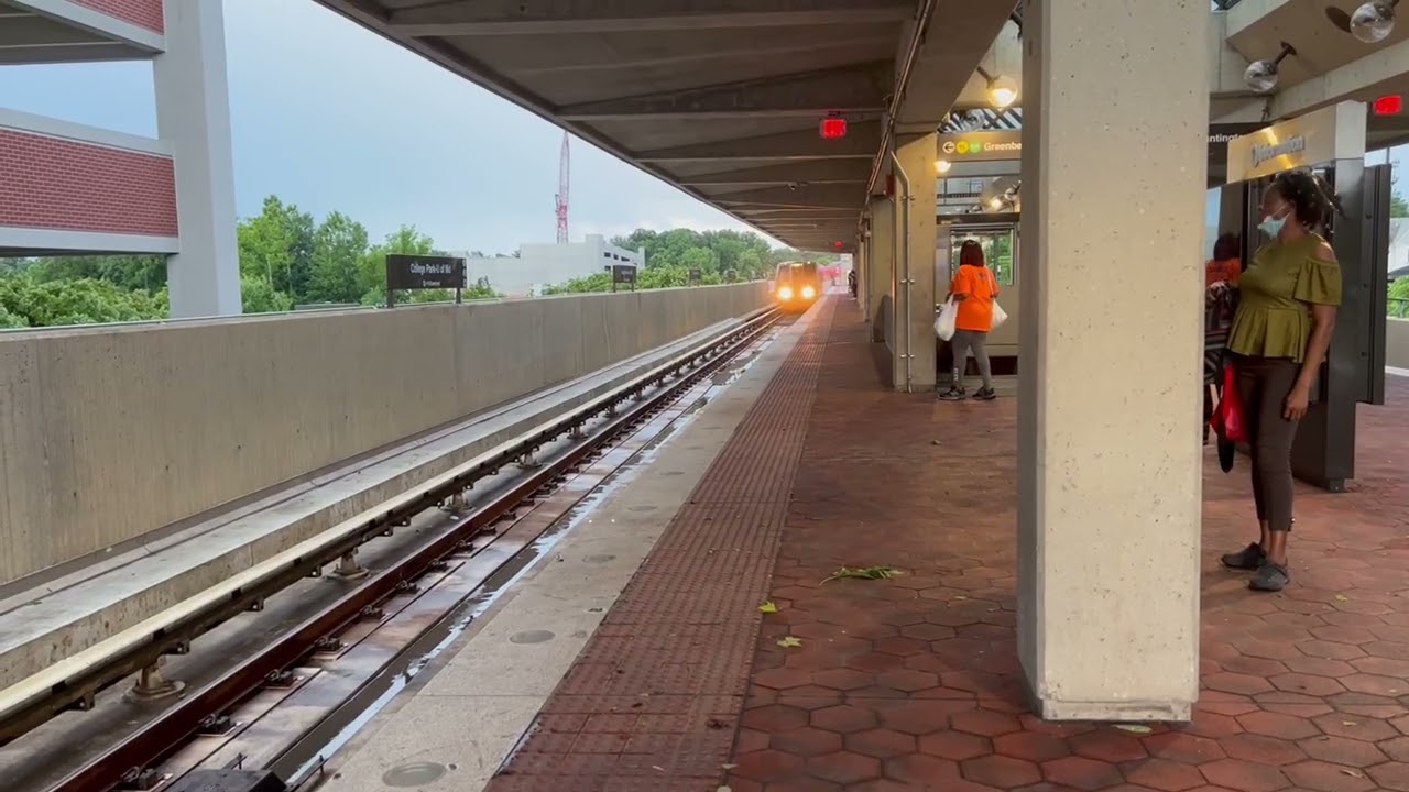 WMATA Metrorail: Rehab Breda 3000 series on the green line entering college park post thunderstorm