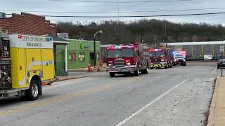Funeral procession honoring retired firefighter Dan Scharf of De Soto Fire Department.