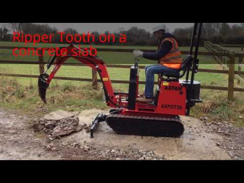 AXPAN AX36PRO with Ripper Tooth at work on a concrete slab