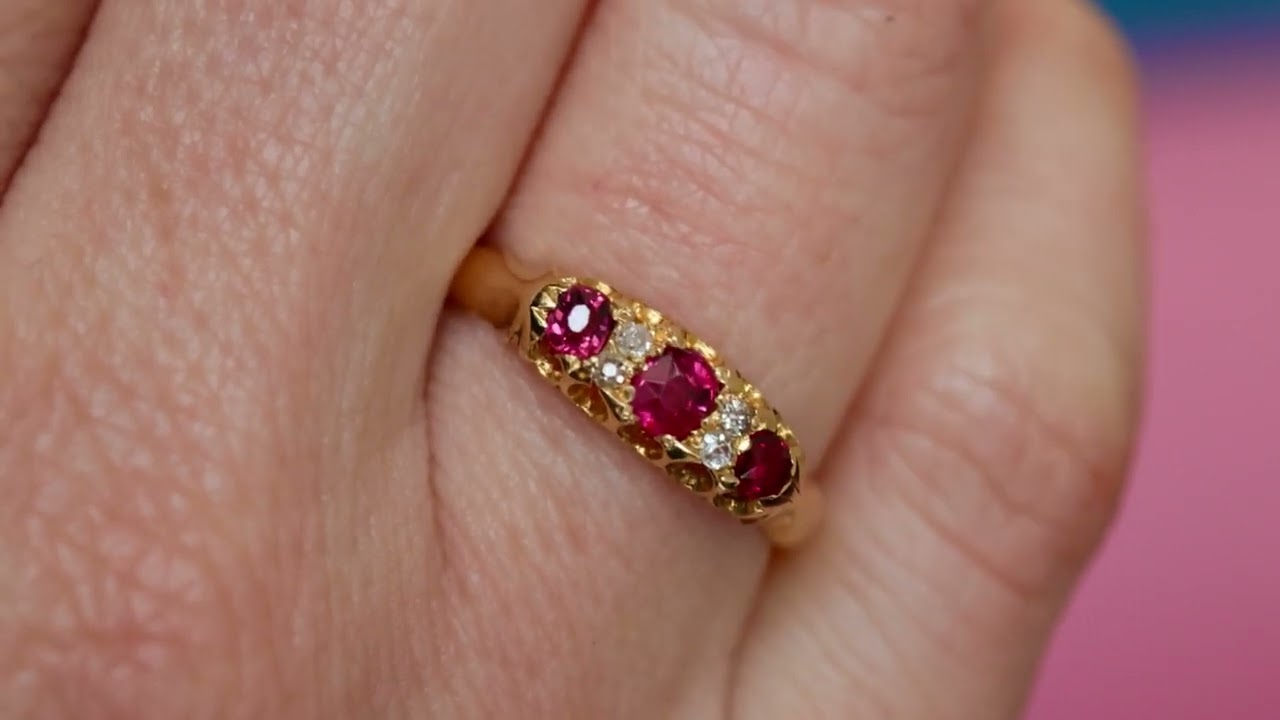 Antique ruby ring with old cut diamonds set in 18K yellow gold