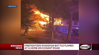 Nashua Firefighters battle house fire