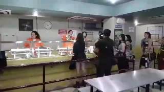Diners queueing for food at the Litchfield Penitentiary Cafeteria experience