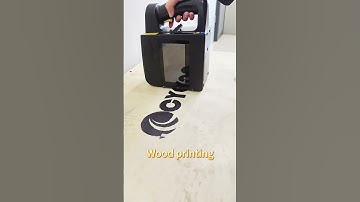 Portable handheld large character inkjet printer.