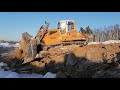 Бульдозер Liebherr PR 764 рекультивирует карьер