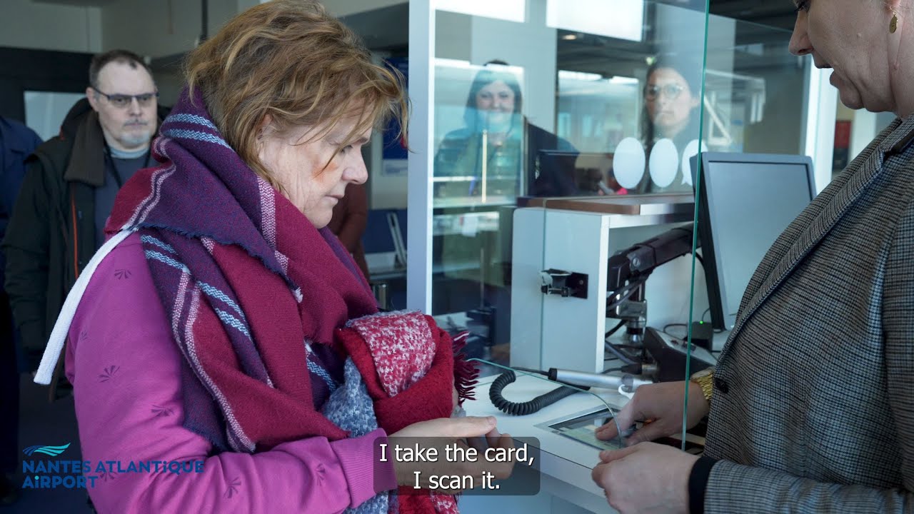 Disability: workers of a sheltered employment center help to improve airport signs