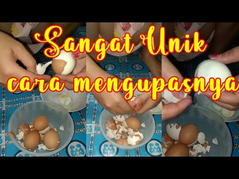 Cewek cantik mengupas telor dengan cara Unik.