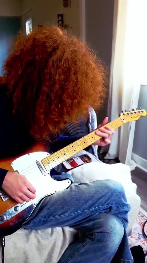 Jesse Bennett playing guitar