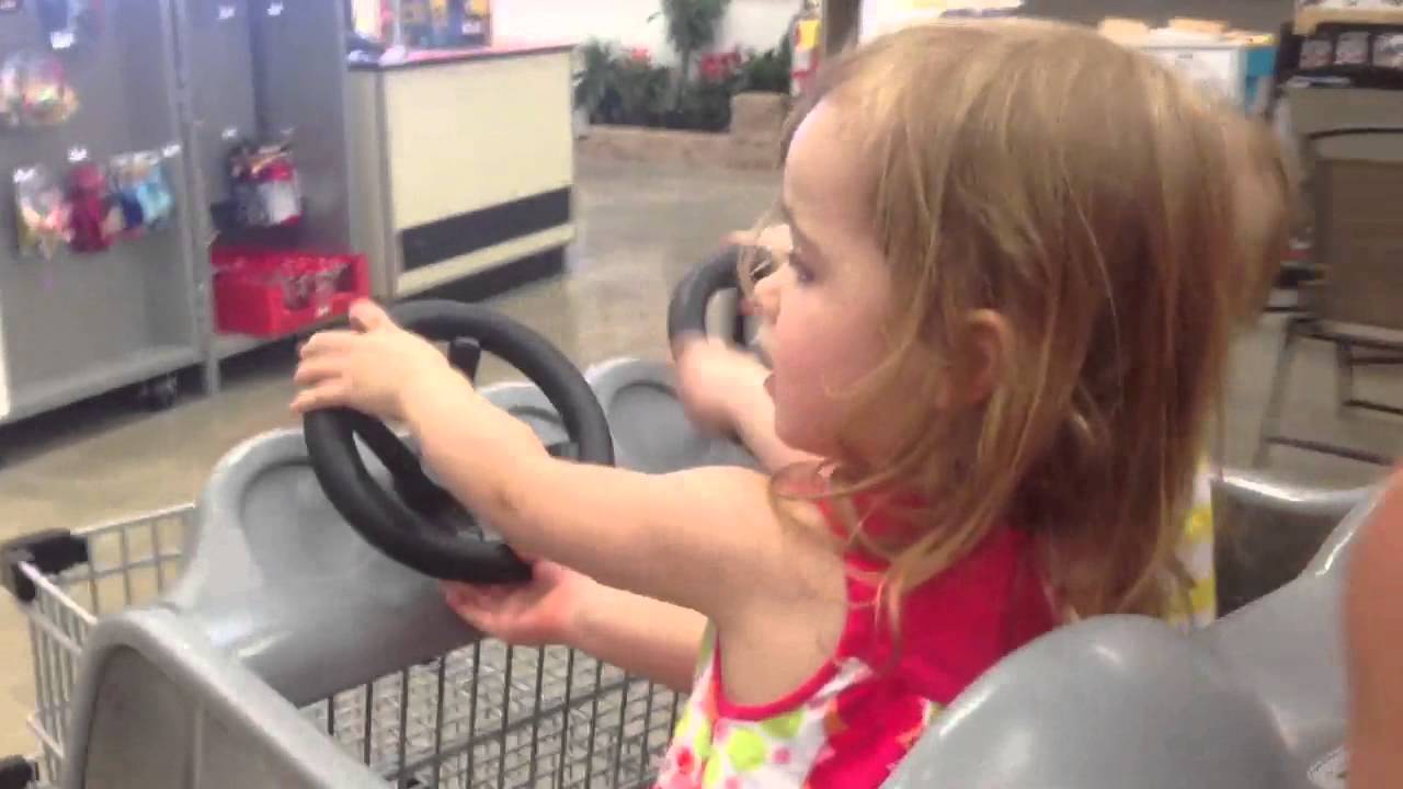 Annika and Avery driving around a crowded Home Depot YouTube