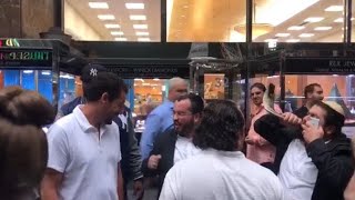 JEWISH ACTOR ADAM SANDLER LISTENS TO SHOFAR IN NYC