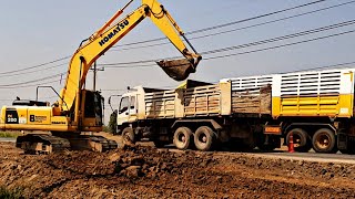 Backhoe Excavator Working in Busy Traffic.Digger Video.Why Does Road Construction Take So Long?