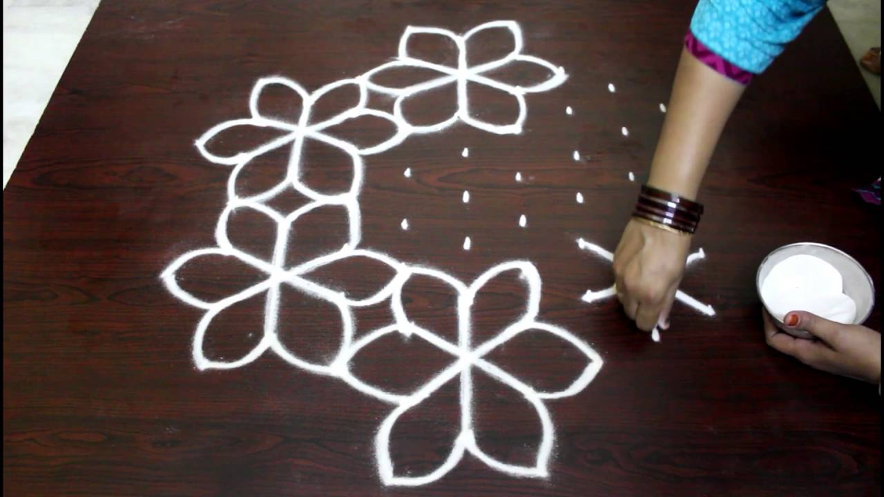 flower kolam designs with 9 to 5 dots- flower muggulu designs with ...