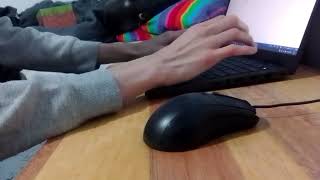 Angry office man destroys cheap mouse