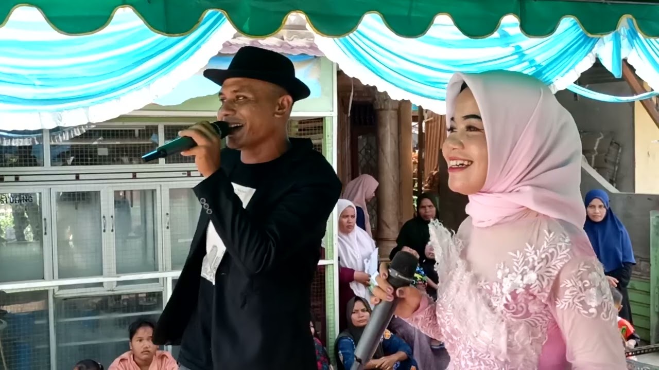 Top Simamora - O Anggi Najogi