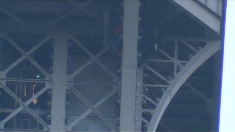 Eiffel Tower climber grabbed by police after sparking evacuation
