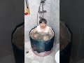 "Girl taking an ice bath in a portable tub with the slogan 'Sexy in good shape it glows'