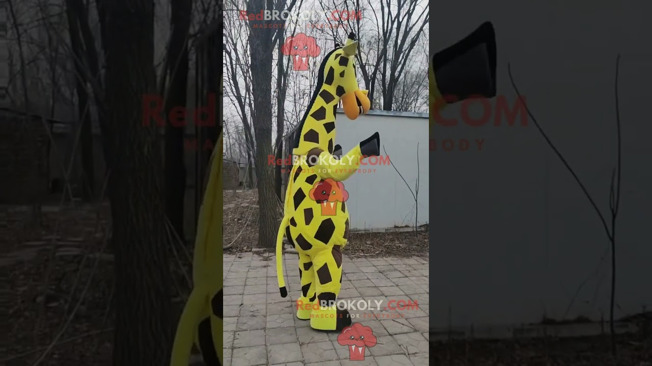 Very tall yellow giraffe man REDBROKOLY mascot with black gloves and brown shoes