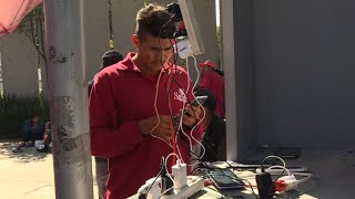 Mobile technology allowing migrants to phone home