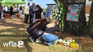 USF community holds vigil in honor of murdered doctoral students