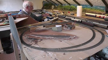 Model Railway 2nd Experiment on the reversing loop.  2 trains both moving in opposite directions.