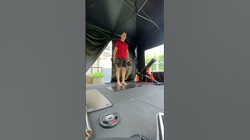 Heels elevated dual dumbbell suitcase squat