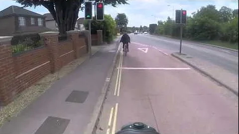 Cyclist Gets Instant Karma After Cutting Into Traffic and Flipping Off Motorist