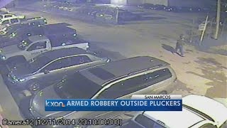 Police seek help solving San Marcos Pluckers lot robbery
