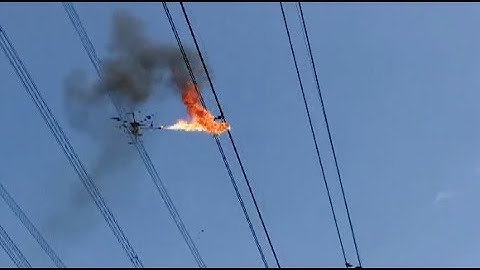 Fire-spitting Drone Cleared up Plastic Film on Power Transmission Line
