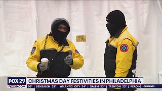 People brave the cold for Christmas Day festivities in Philadelphia