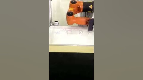 Kuka robot drawing a VW beetle